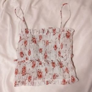 white ruffled top with roses